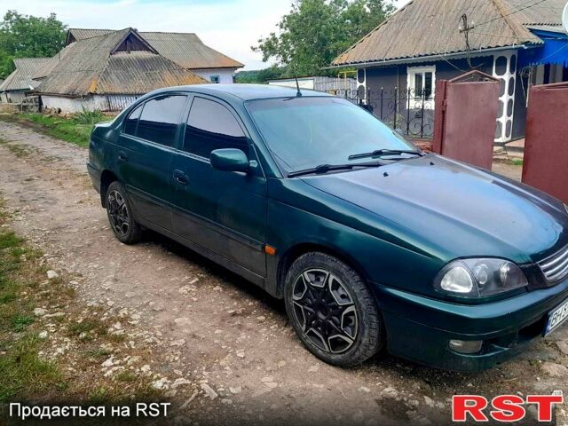 Зеленый Тойота Авенсис, объемом двигателя 2 л и пробегом 303 тыс. км за 3500 $, фото 6 на Automoto.ua