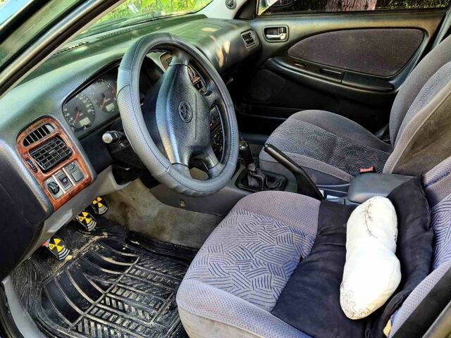 Зеленый Тойота Авенсис, объемом двигателя 2 л и пробегом 303 тыс. км за 3500 $, фото 5 на Automoto.ua