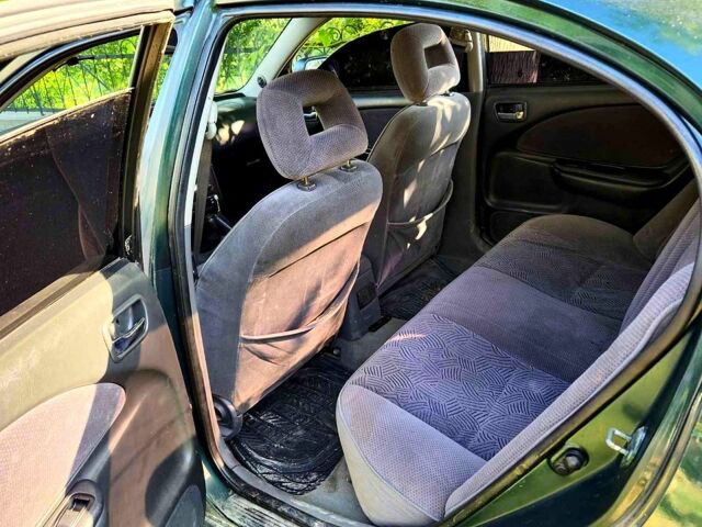 Зеленый Тойота Авенсис, объемом двигателя 2 л и пробегом 303 тыс. км за 3500 $, фото 3 на Automoto.ua