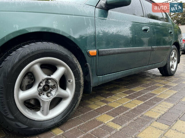 Зеленый Тойота Авенсис, объемом двигателя 1.8 л и пробегом 426 тыс. км за 3800 $, фото 2 на Automoto.ua