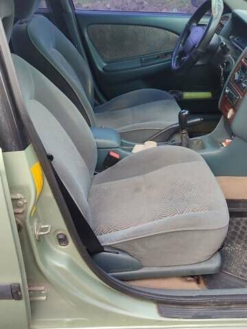 Зеленый Тойота Авенсис, объемом двигателя 1.8 л и пробегом 310 тыс. км за 3200 $, фото 7 на Automoto.ua