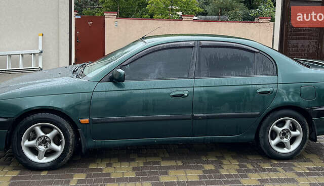 Зеленый Тойота Авенсис, объемом двигателя 1.8 л и пробегом 426 тыс. км за 3800 $, фото 1 на Automoto.ua