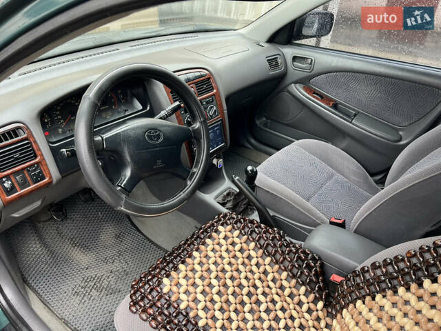 Зеленый Тойота Авенсис, объемом двигателя 1.8 л и пробегом 426 тыс. км за 3800 $, фото 11 на Automoto.ua