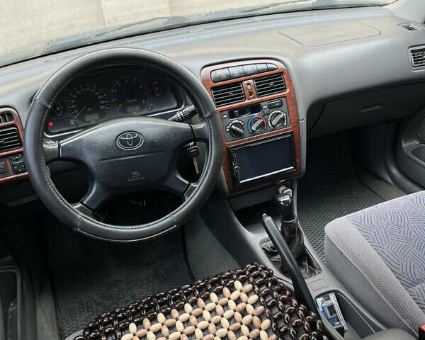 Зеленый Тойота Авенсис, объемом двигателя 1.8 л и пробегом 426 тыс. км за 3800 $, фото 4 на Automoto.ua