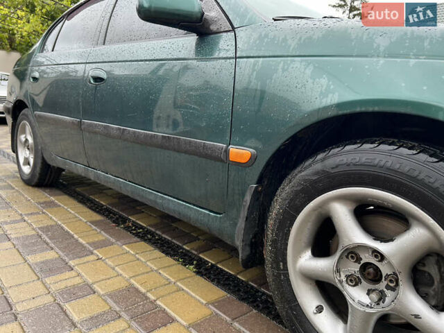 Зеленый Тойота Авенсис, объемом двигателя 1.8 л и пробегом 426 тыс. км за 3800 $, фото 3 на Automoto.ua