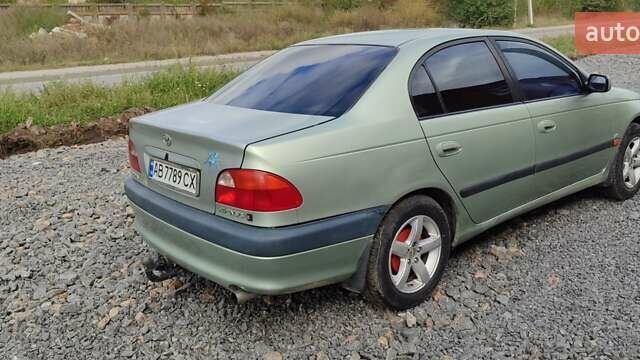 Зеленый Тойота Авенсис, объемом двигателя 1.8 л и пробегом 310 тыс. км за 3200 $, фото 8 на Automoto.ua