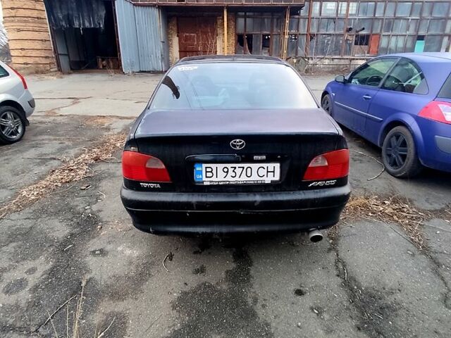 Зеленый Тойота Авенсис, объемом двигателя 1.6 л и пробегом 285 тыс. км за 2800 $, фото 2 на Automoto.ua