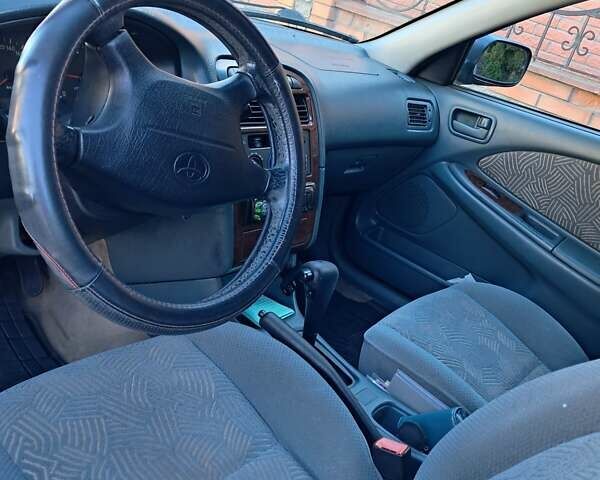 Зеленый Тойота Авенсис, объемом двигателя 1.8 л и пробегом 240 тыс. км за 4200 $, фото 7 на Automoto.ua