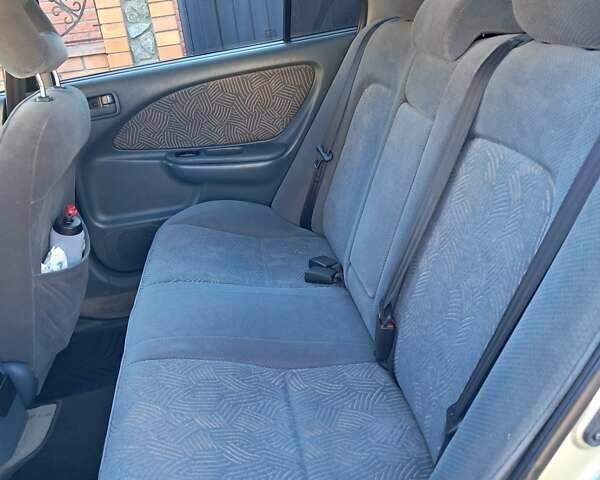 Зеленый Тойота Авенсис, объемом двигателя 1.8 л и пробегом 240 тыс. км за 4200 $, фото 1 на Automoto.ua