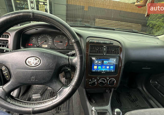 Зеленый Тойота Авенсис, объемом двигателя 2 л и пробегом 306 тыс. км за 4300 $, фото 11 на Automoto.ua