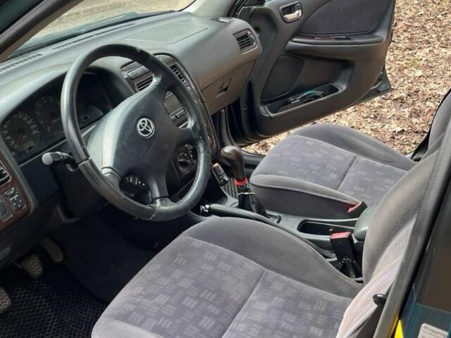 Зеленый Тойота Авенсис, объемом двигателя 1.8 л и пробегом 340 тыс. км за 3500 $, фото 1 на Automoto.ua