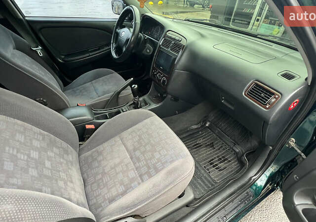 Зеленый Тойота Авенсис, объемом двигателя 2 л и пробегом 306 тыс. км за 4300 $, фото 13 на Automoto.ua