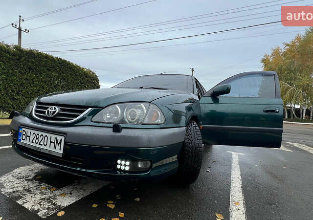 Зеленый Тойота Авенсис, объемом двигателя 2 л и пробегом 306 тыс. км за 4300 $, фото 7 на Automoto.ua