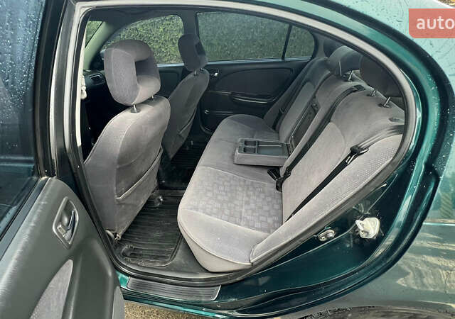 Зеленый Тойота Авенсис, объемом двигателя 2 л и пробегом 306 тыс. км за 4300 $, фото 21 на Automoto.ua