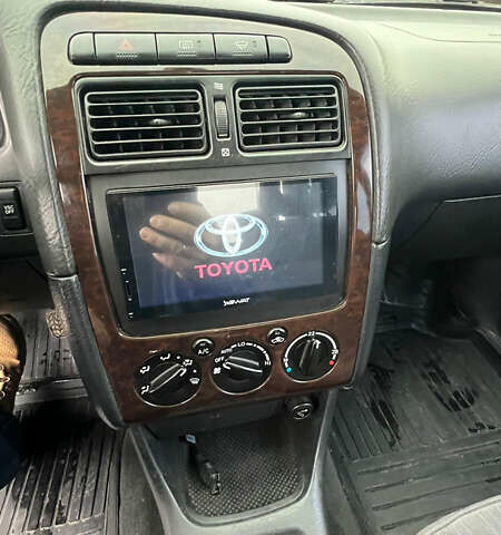 Зеленый Тойота Авенсис, объемом двигателя 2 л и пробегом 306 тыс. км за 4300 $, фото 5 на Automoto.ua