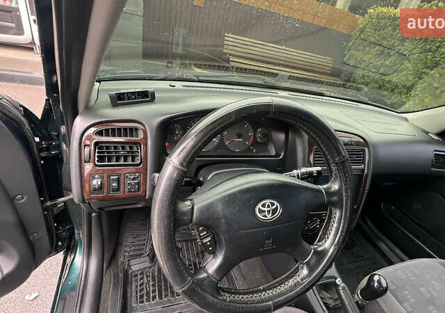 Зеленый Тойота Авенсис, объемом двигателя 2 л и пробегом 306 тыс. км за 4300 $, фото 24 на Automoto.ua