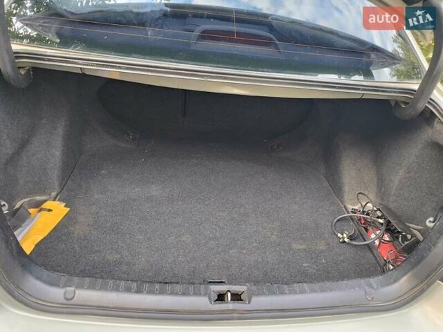 Зеленый Тойота Авенсис, объемом двигателя 2 л и пробегом 233 тыс. км за 4900 $, фото 5 на Automoto.ua