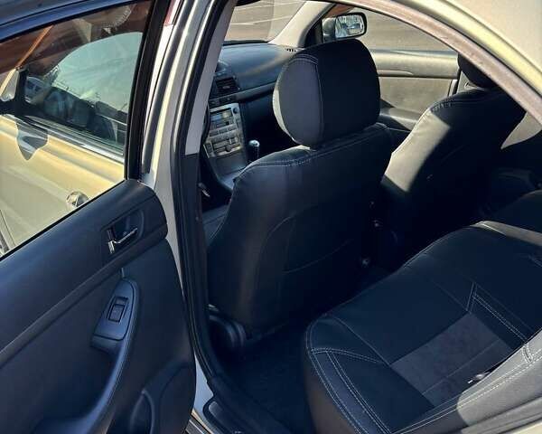 Зеленый Тойота Авенсис, объемом двигателя 1.8 л и пробегом 254 тыс. км за 5500 $, фото 22 на Automoto.ua