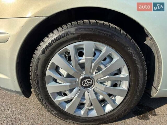 Зеленый Тойота Авенсис, объемом двигателя 1.8 л и пробегом 254 тыс. км за 5500 $, фото 11 на Automoto.ua