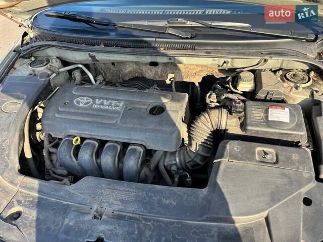 Зеленый Тойота Авенсис, объемом двигателя 1.8 л и пробегом 254 тыс. км за 5500 $, фото 21 на Automoto.ua