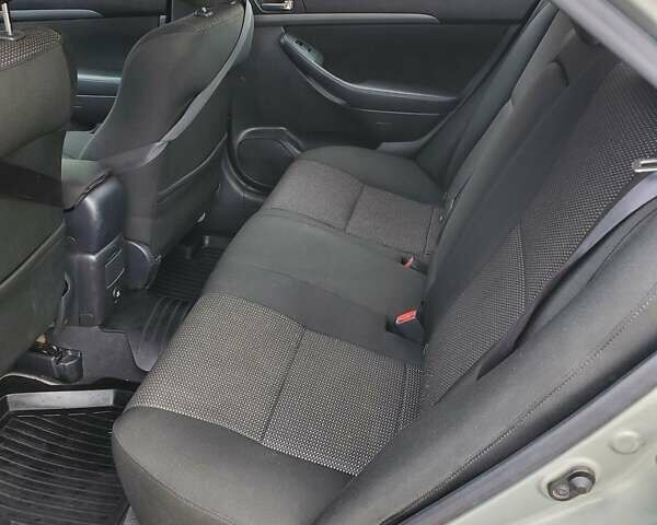 Зеленый Тойота Авенсис, объемом двигателя 1.79 л и пробегом 96 тыс. км за 9300 $, фото 9 на Automoto.ua