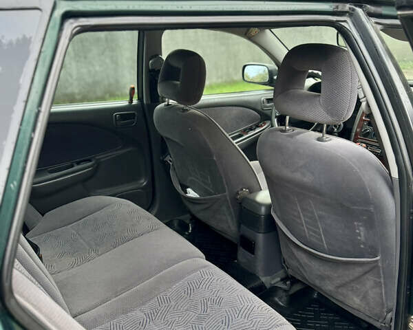 Зеленый Тойота Авенсис, объемом двигателя 2 л и пробегом 472 тыс. км за 3000 $, фото 6 на Automoto.ua