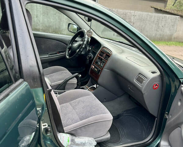 Зеленый Тойота Авенсис, объемом двигателя 2 л и пробегом 472 тыс. км за 3000 $, фото 4 на Automoto.ua