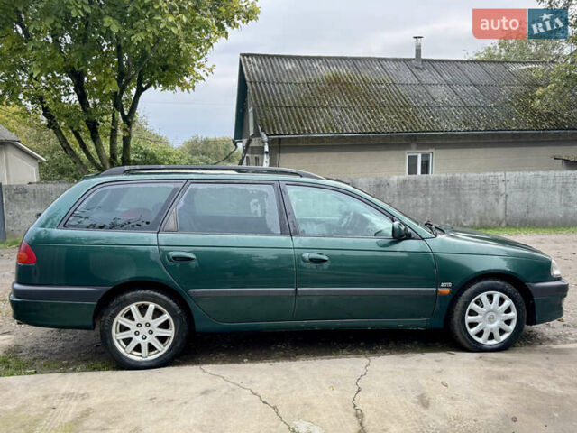 Зеленый Тойота Авенсис, объемом двигателя 2 л и пробегом 472 тыс. км за 3000 $, фото 3 на Automoto.ua