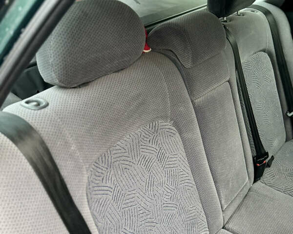 Зеленый Тойота Авенсис, объемом двигателя 2 л и пробегом 472 тыс. км за 3000 $, фото 7 на Automoto.ua