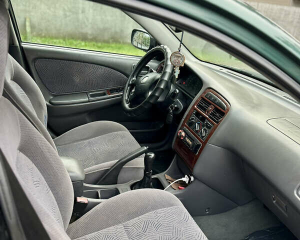 Зеленый Тойота Авенсис, объемом двигателя 2 л и пробегом 472 тыс. км за 3000 $, фото 5 на Automoto.ua