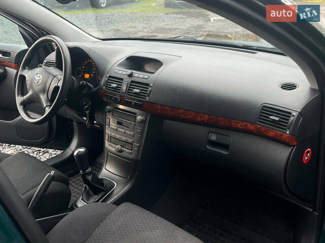 Зеленый Тойота Авенсис, объемом двигателя 2 л и пробегом 304 тыс. км за 7190 $, фото 5 на Automoto.ua