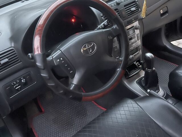 Зелений Тойота Авенсіс, об'ємом двигуна 2 л та пробігом 345 тис. км за 4900 $, фото 6 на Automoto.ua