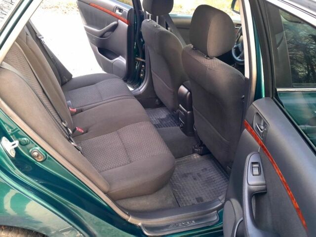 Зелений Тойота Авенсіс, об'ємом двигуна 2 л та пробігом 290 тис. км за 2599 $, фото 5 на Automoto.ua