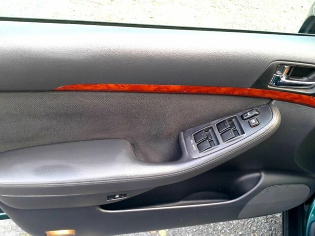 Зелений Тойота Авенсіс, об'ємом двигуна 2 л та пробігом 290 тис. км за 2599 $, фото 9 на Automoto.ua