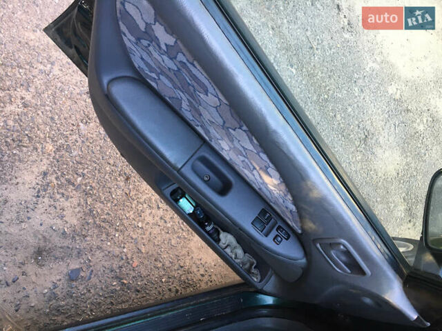 Зеленый Тойота Авенсис, объемом двигателя 1.8 л и пробегом 545 тыс. км за 2600 $, фото 11 на Automoto.ua