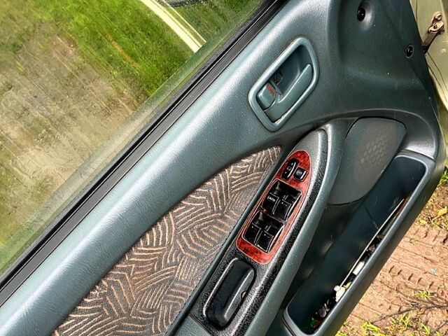 Зеленый Тойота Авенсис, объемом двигателя 1.8 л и пробегом 420 тыс. км за 2999 $, фото 6 на Automoto.ua