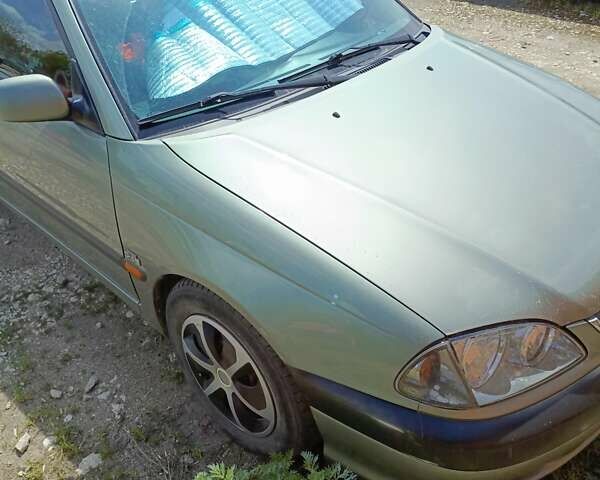 Зеленый Тойота Авенсис, объемом двигателя 2 л и пробегом 344 тыс. км за 3900 $, фото 4 на Automoto.ua