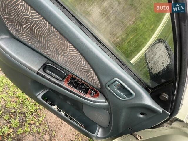 Зелений Тойота Авенсіс, об'ємом двигуна 1.8 л та пробігом 420 тис. км за 2950 $, фото 6 на Automoto.ua