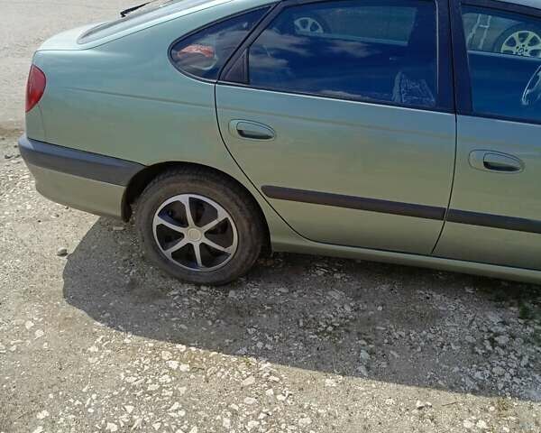 Зеленый Тойота Авенсис, объемом двигателя 2 л и пробегом 344 тыс. км за 3900 $, фото 3 на Automoto.ua