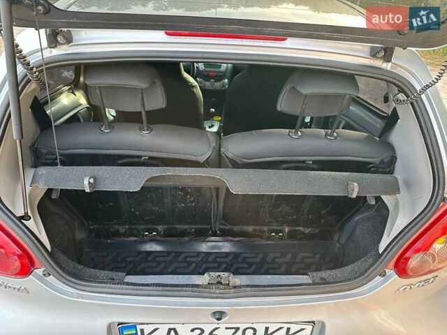 Білий Тойота Айго, об'ємом двигуна 1 л та пробігом 262 тис. км за 4500 $, фото 4 на Automoto.ua