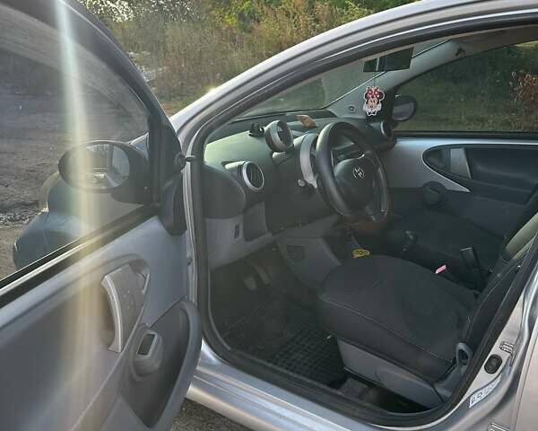 Білий Тойота Айго, об'ємом двигуна 1 л та пробігом 262 тис. км за 4500 $, фото 11 на Automoto.ua