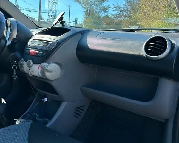 Чорний Тойота Айго, об'ємом двигуна 1 л та пробігом 185 тис. км за 3200 $, фото 2 на Automoto.ua