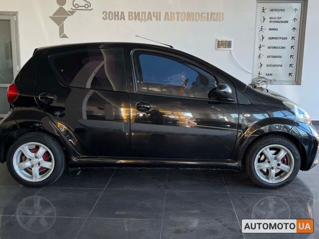 Черный Тойота Айго, объемом двигателя 1 л и пробегом 204 тыс. км за 5500 $, фото 7 на Automoto.ua