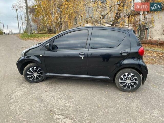 Черный Тойота Айго, объемом двигателя 1 л и пробегом 198 тыс. км за 4100 $, фото 12 на Automoto.ua