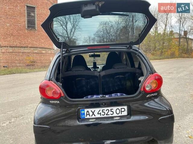 Черный Тойота Айго, объемом двигателя 1 л и пробегом 198 тыс. км за 4100 $, фото 3 на Automoto.ua