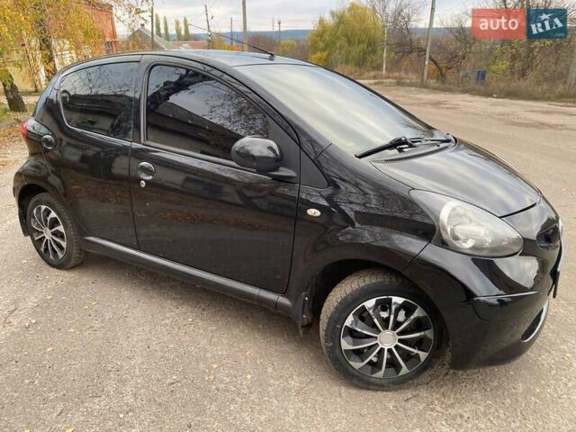 Черный Тойота Айго, объемом двигателя 1 л и пробегом 198 тыс. км за 4100 $, фото 9 на Automoto.ua