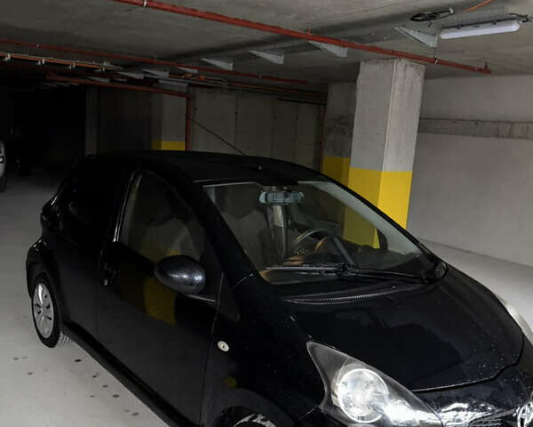 Чорний Тойота Айго, об'ємом двигуна 1 л та пробігом 167 тис. км за 6200 $, фото 1 на Automoto.ua
