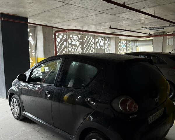 Чорний Тойота Айго, об'ємом двигуна 1 л та пробігом 167 тис. км за 6200 $, фото 6 на Automoto.ua