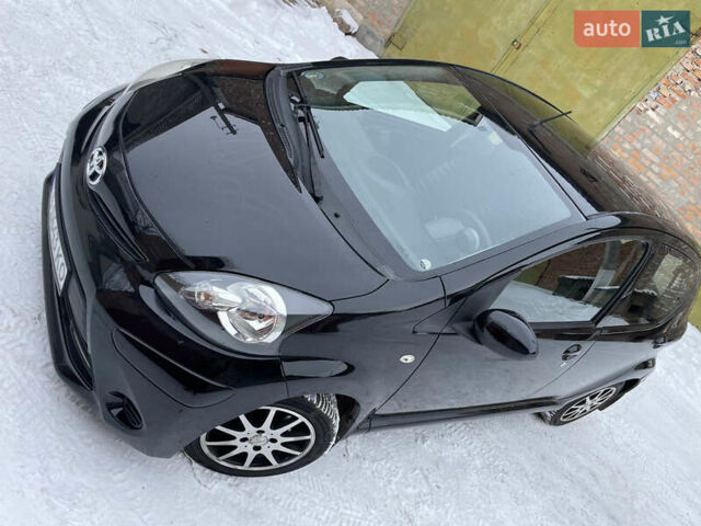 Чорний Тойота Айго, об'ємом двигуна 1 л та пробігом 174 тис. км за 6500 $, фото 19 на Automoto.ua