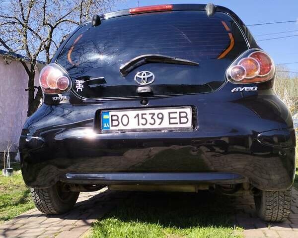 Черный Тойота Айго, объемом двигателя 0.9 л и пробегом 180 тыс. км за 6500 $, фото 1 на Automoto.ua
